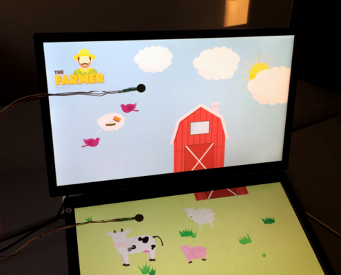 The Farmer: setup with two monitors and two touch sensors
